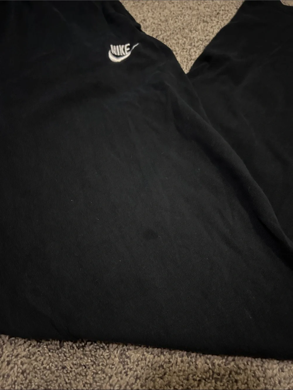 Nike Men's Black Jogger Sweatpants with White Swoosh